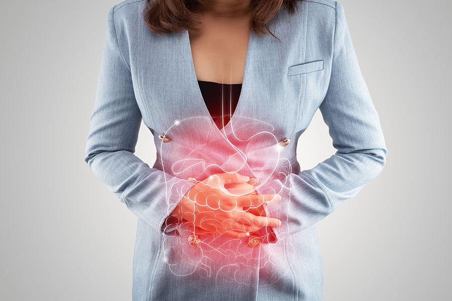 Illustration of internal organs is on the woman's body against t